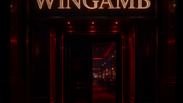 Wingamb illuminated metallic letters above a luxury casino entrance with crimson and black tones